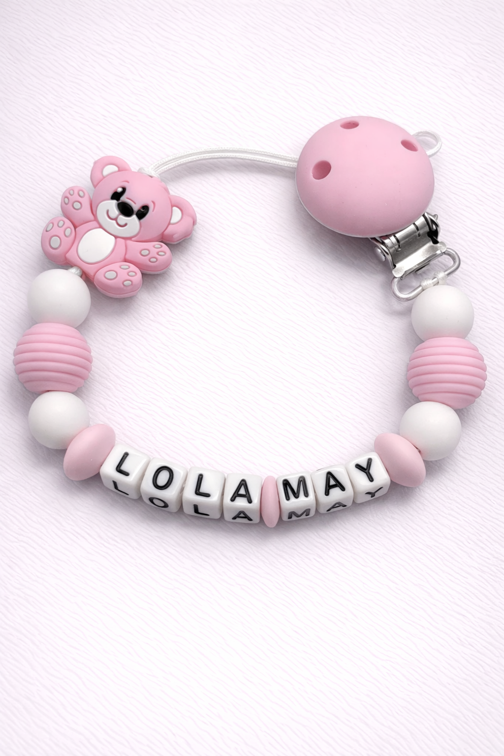 pink and white teddybear dummy clip