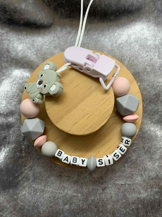 Baby Sister Koala Dummy Clip - Silicone Pacifier Holder (Plastic Letter Design)