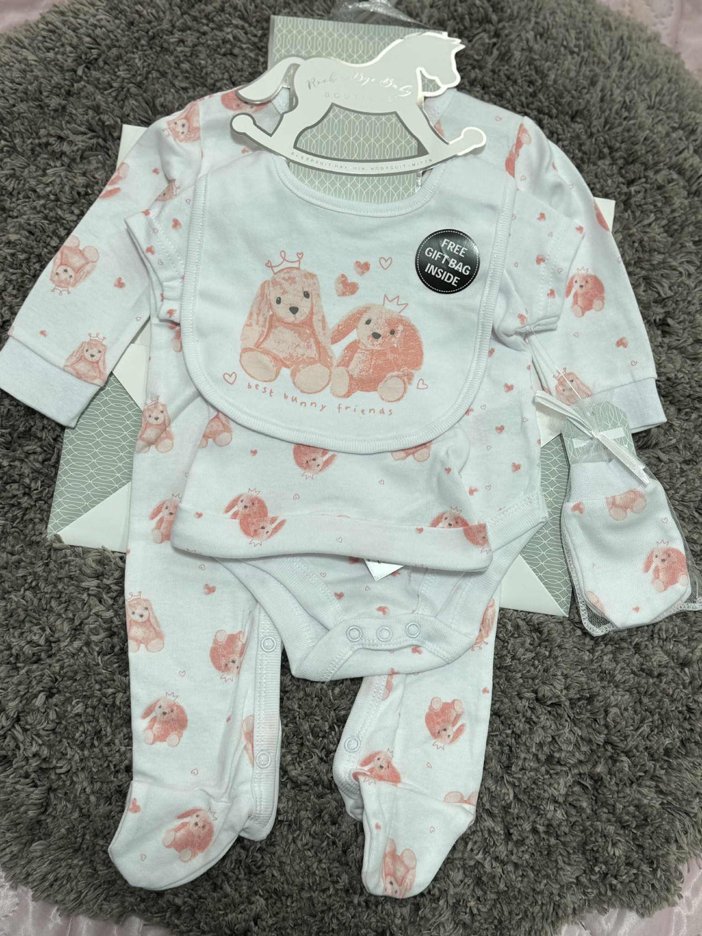 Adorable Baby Girls 5 Piece Layette gift set in Pink &amp; White with bunny prints. Set consists of sleepsuit, bodysuit, hat, bib and mittens and Giftbag. Made of 100% Cotton.