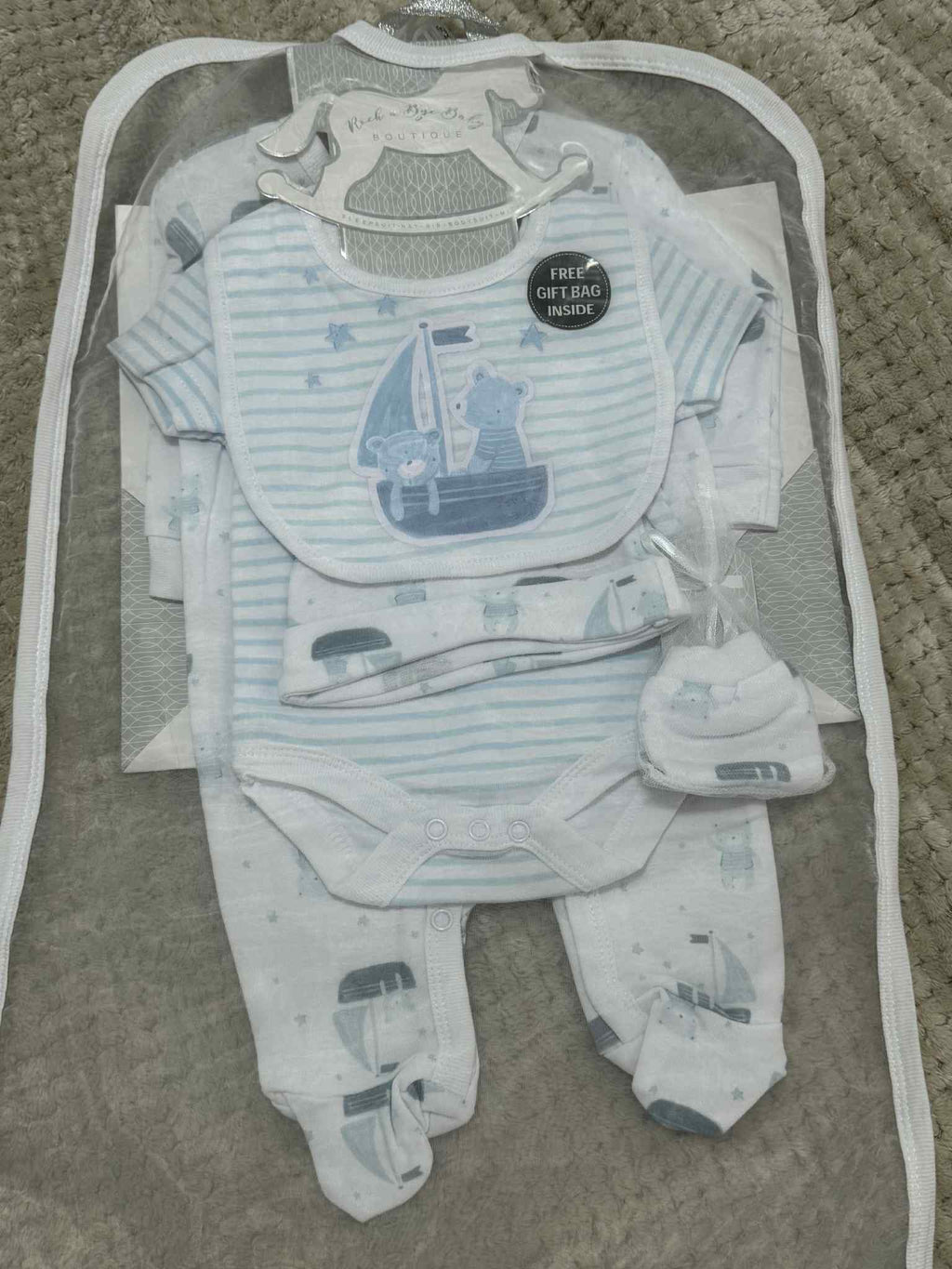 Adorable Baby Boys 5 Piece Layette gift set in Blue &amp; White with Teddy's prints. Set consists of sleepsuit, bodysuit, hat, bib and mittens and Giftbag.