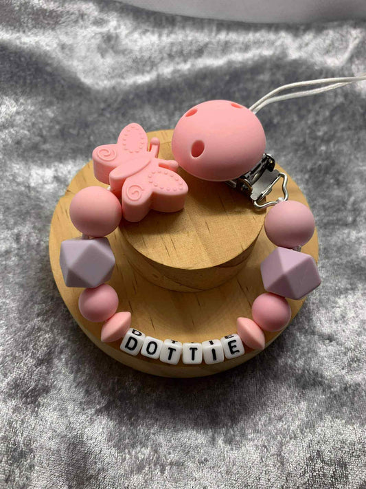 Coral Pink Butterfly Dummy Clip - Custom Silicone Pacifier Holder (Plastic Letter Design)