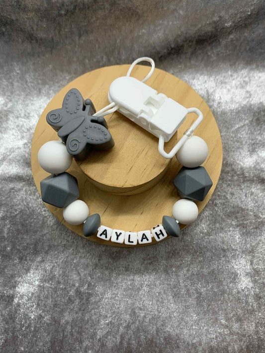 Grey Butterfly Dummy Clip - Custom Silicone Pacifier Holder (Plastic Letter Design)