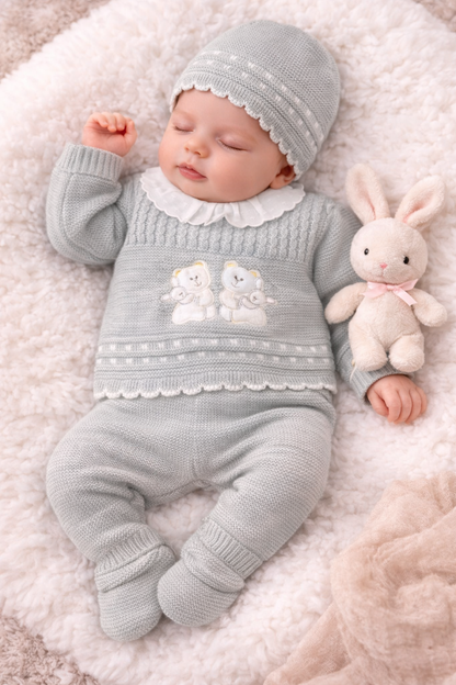 Adorable 3-piece Spanish knit baby set in grey with bunny appliqué. Includes jumper, trousers & hat in premium gift box. Perfect newborn gift for special occasions.