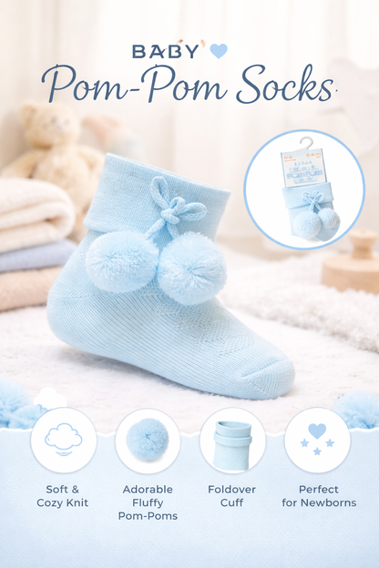 The sweetest finishing touch for your newborn’s outfit. These baby blue pom-pom socks are crafted from soft knit fabric to keep little feet warm and comfortable during those early days.

Featuring plush pom-pom details and a snug fold-over cuff, they’re designed to stay on while remaining gentle on sensitive skin. A beautiful choice for everyday wear or as a thoughtful baby gift.