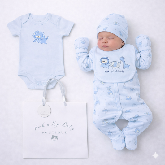 Baby outfit set with blue onesie, bib, hat, and booties on a white background with 'Rock a Bye Baby Boutique' branding.