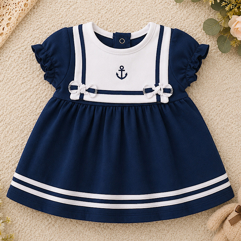 Baby girl nautical sailor dress in navy and white with embroidered anchor and flutter sleeves