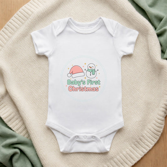 White baby onesie with 'Caution Instructions Not Included' text on a textured surface.