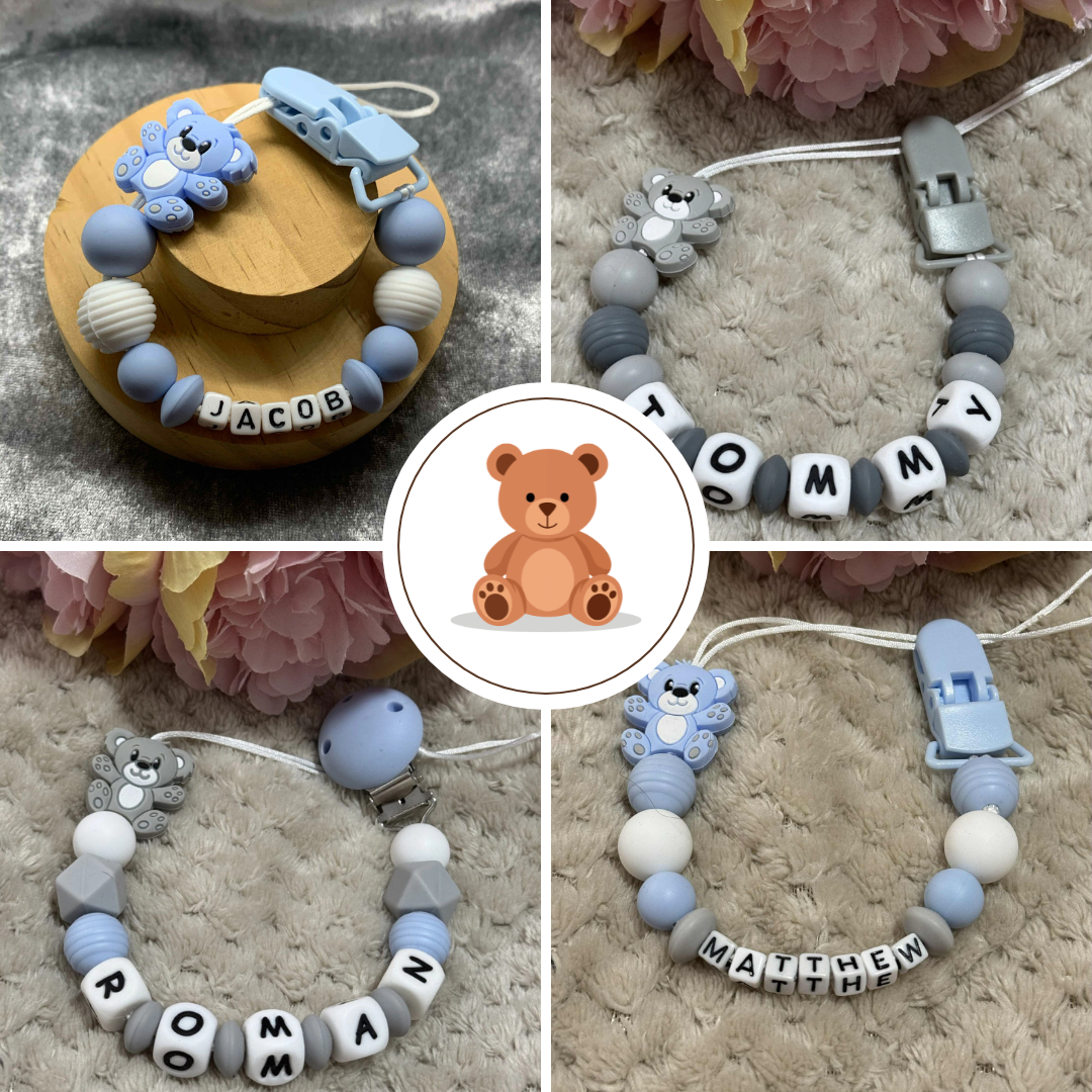 A collection of blue, grey and green dummy clips with teddybear focals handmade by ttcreations. Personalisation available.