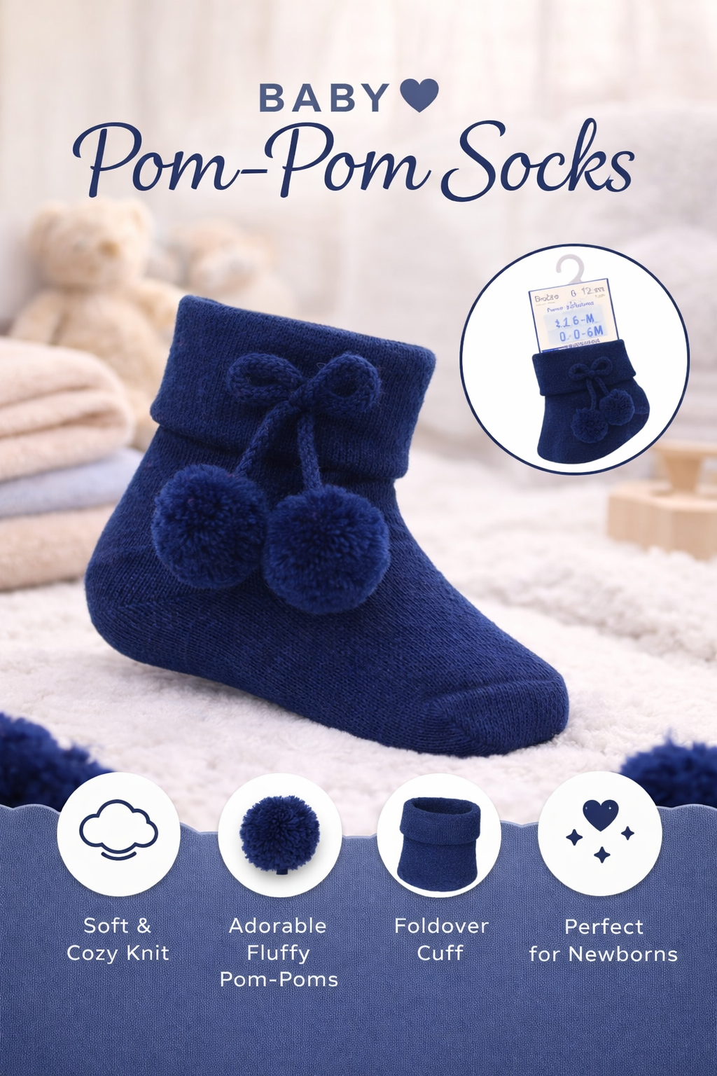 Sleeping newborn dressed in white onesie and navy pom-pom baby socks