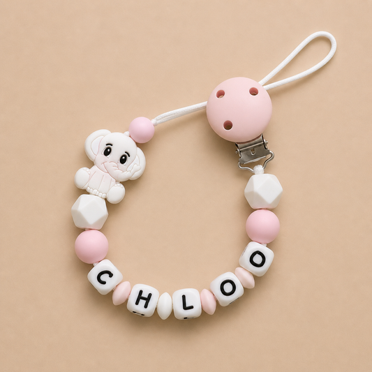 dummy clip with 'CHLOE' beads on a beige background