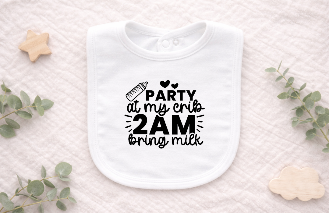 Flat lay of a humorous baby bib designed as a funny newborn gift.