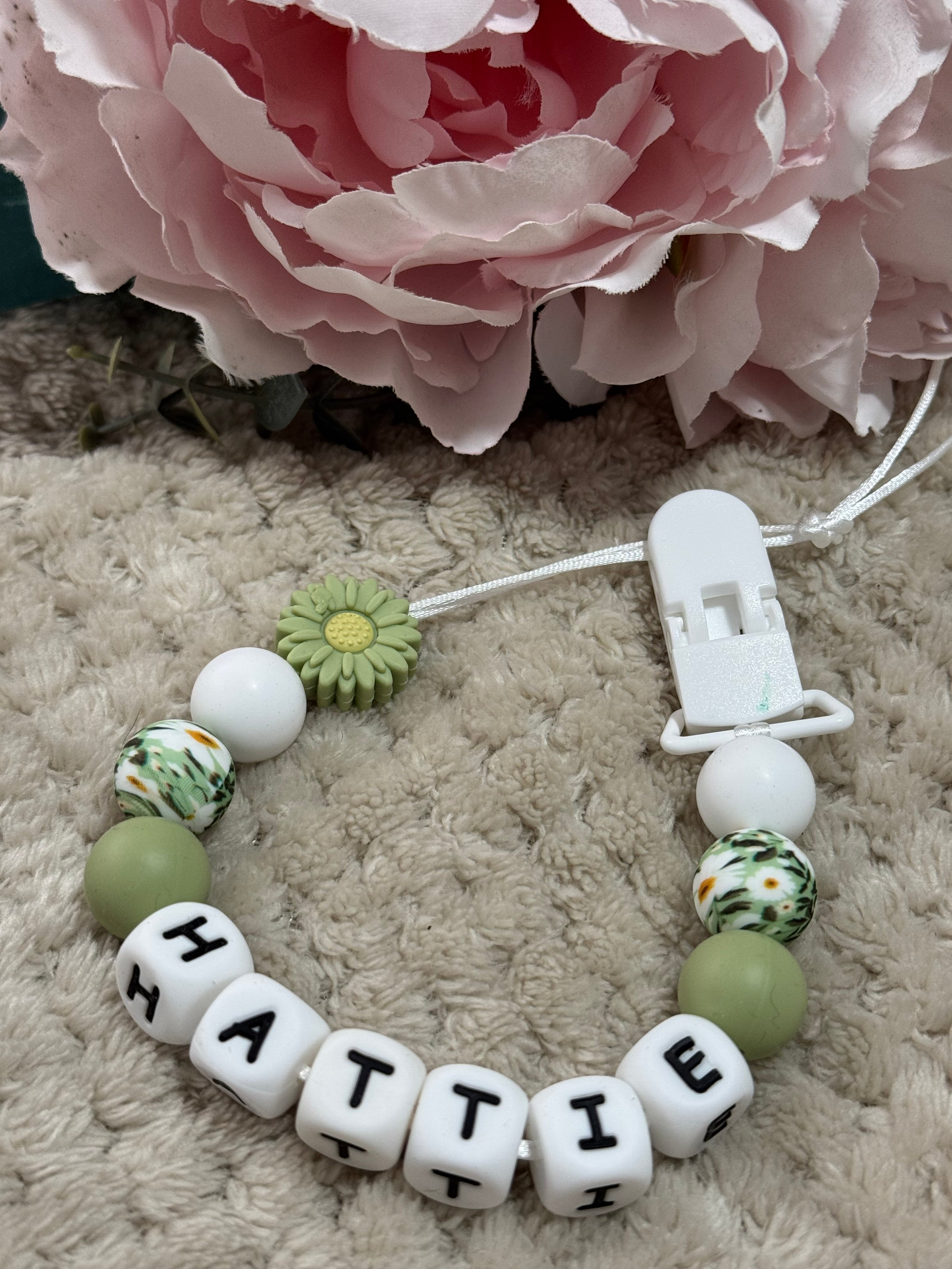 Green, White and floral pattern beads on a dummy chain personalised with any name