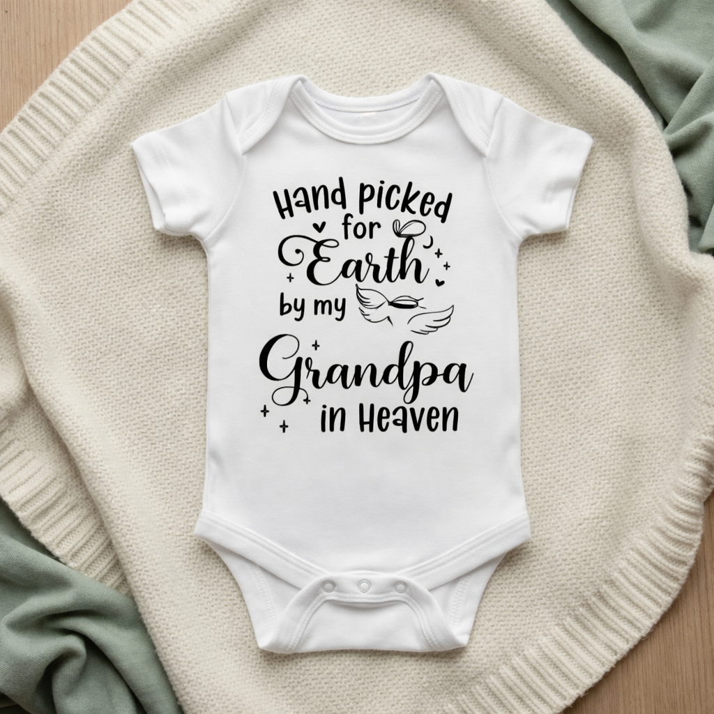 White baby onesie with text on a textured surface Handpicked for Earth by my Grandpa in Heaven Baby Bodysuit