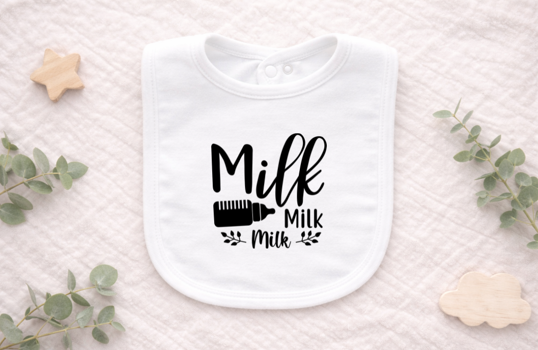 Minimal white baby bib with black “Milk, Milk, Milk” print