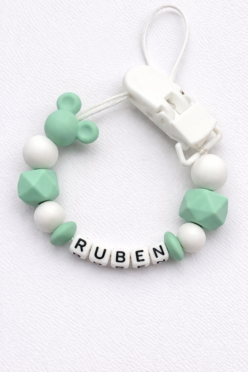 Mint green and white silicone dummy clip personalised