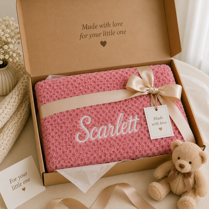 Luxury gift-ready presentation featuring a personalised dusky pink bubble blanket embroidered with "Scarlett" in White, wrapped with a satin ribbon inside a premium gift box. Perfect for baby showers, newborn gifts and keepsakes.