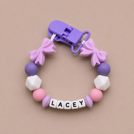 Colorful dummy clip with 'LACEY' on a beige background