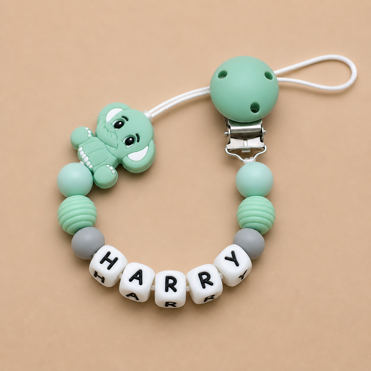 dummy clip with name 'Harry' on a beige background