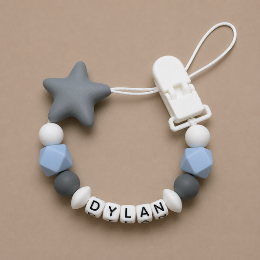 dummy clip with star and geometric beads on a beige background