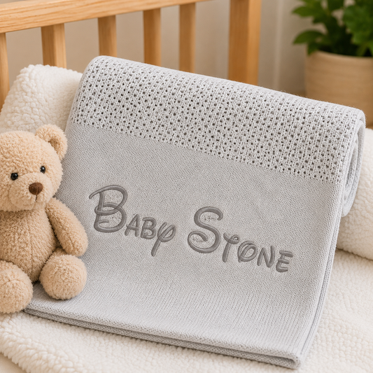 Personalised grey cellular cotton knitted baby blanket with embroidered name
