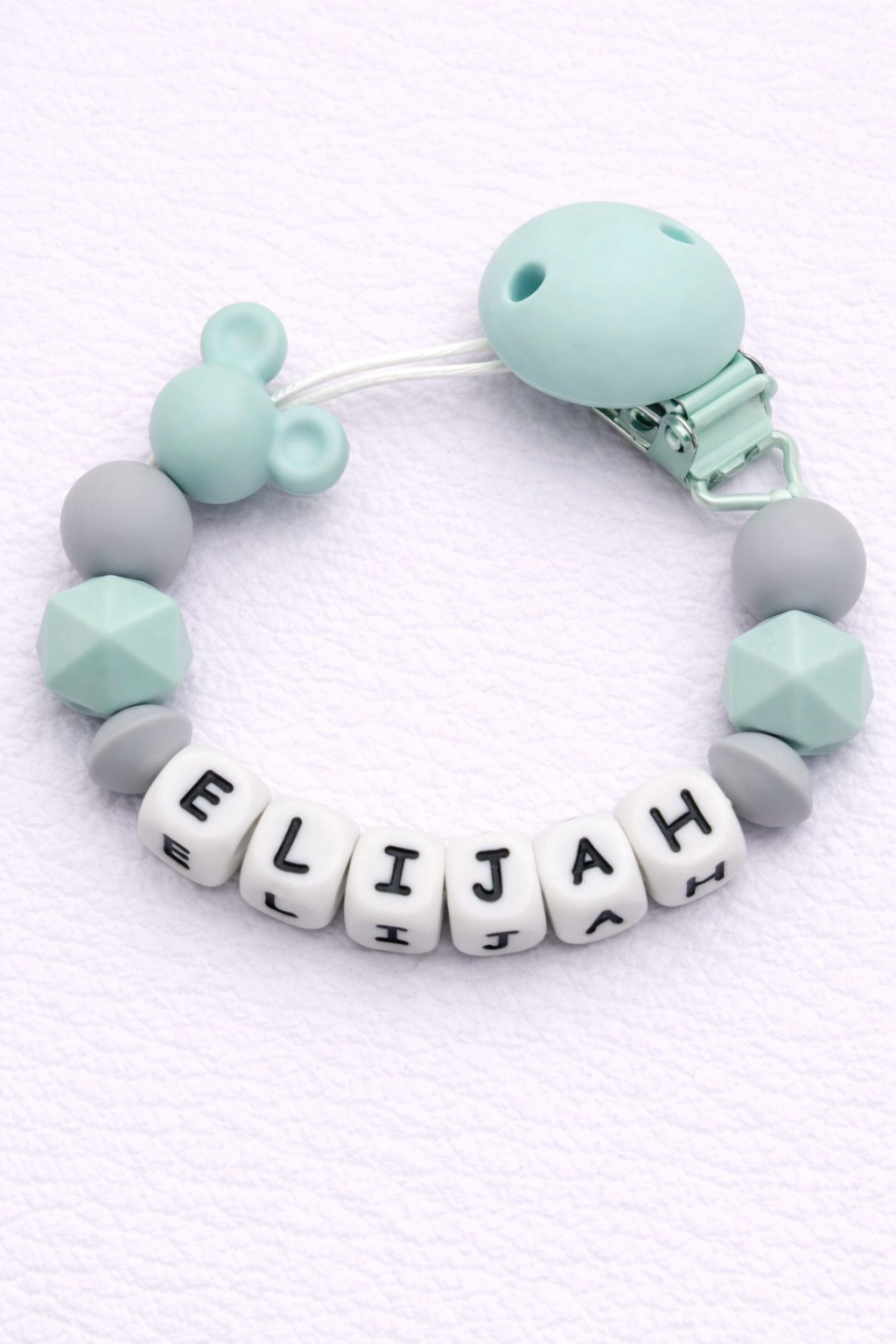 dummy clip with 'ELIJAH' on a white backgroun