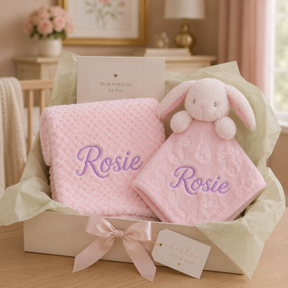 Personalised pink bubble blanket and bunny comforter baby gift box with sage green tissue paper and hello little one gift tag.