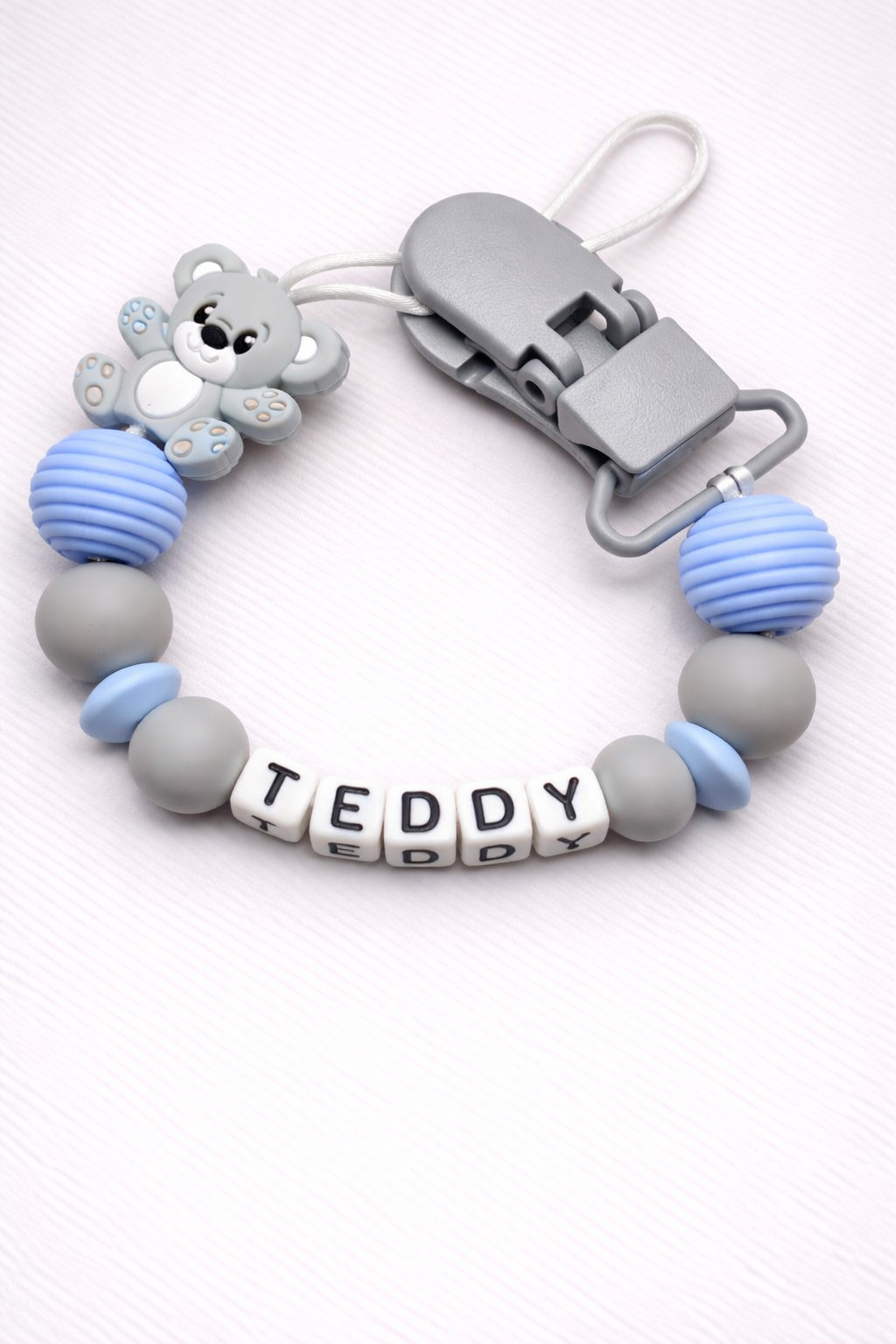 blue and grey teddybear dummy clip