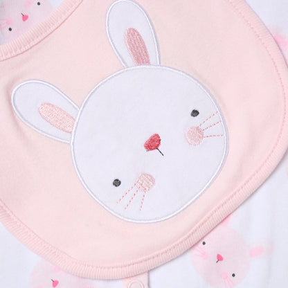 Pink baby bib with embroidered bunny face design on a light pink background