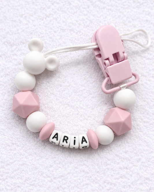 Pink and white  Dummy Chain with a clip on a white background