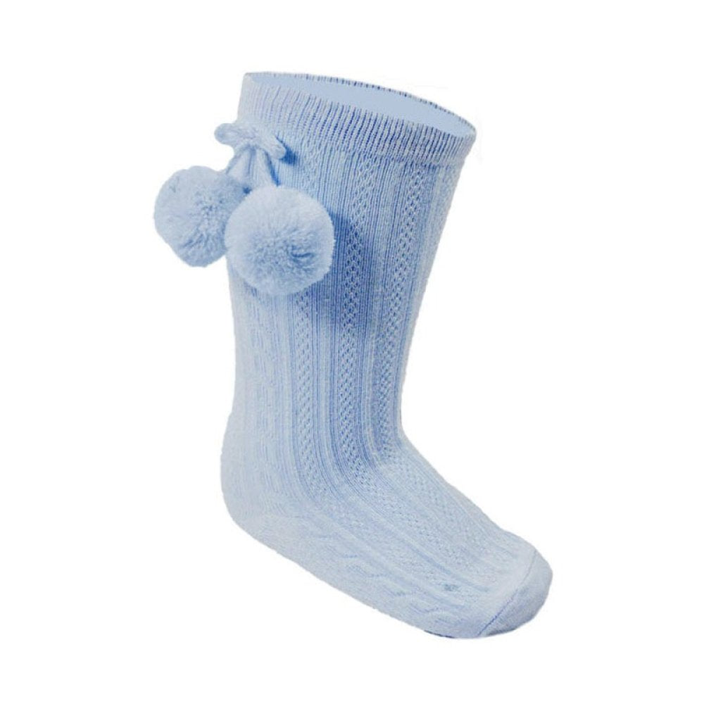Light blue sock with pom-poms on a white background