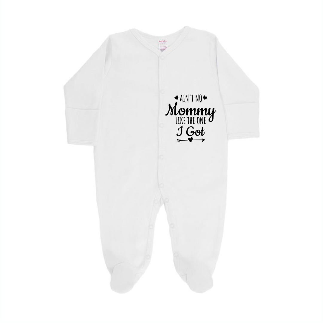 White baby onesie with text on a white background