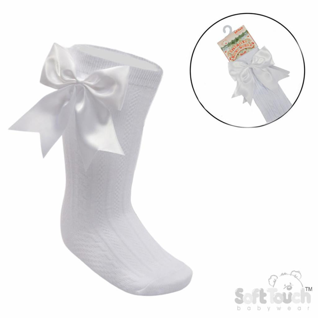 White socks with large bows on a white background, featuring the 'Soft Touch' brand.