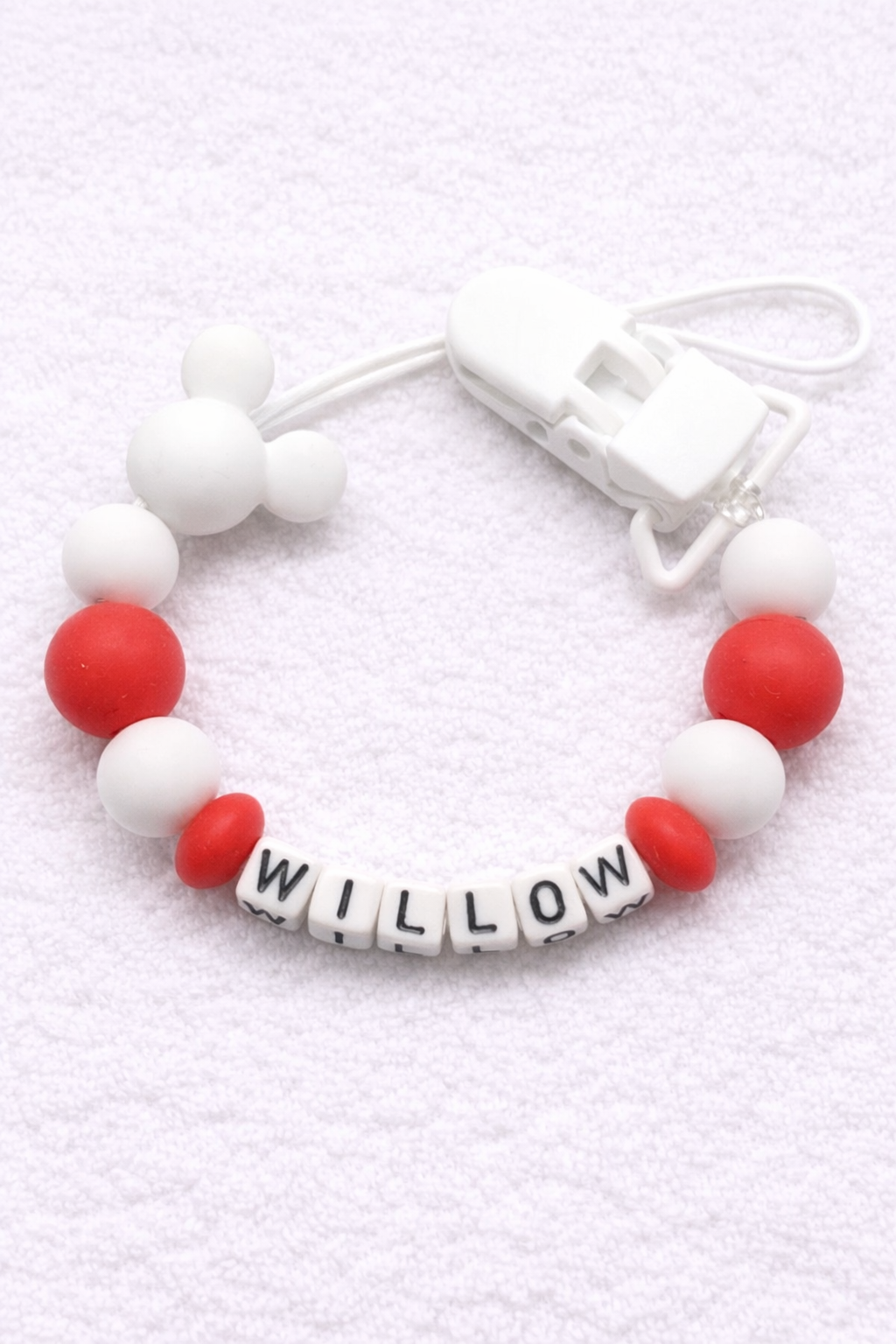 Silicone Dummy Clip with 'WILLOW' on a white background