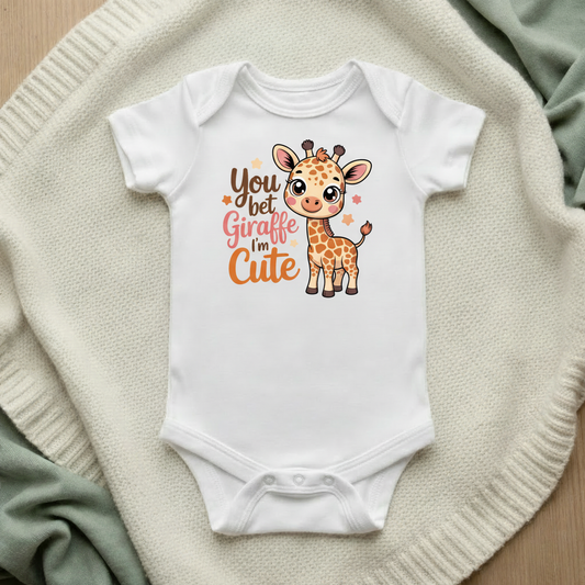 You Bet Giraffe I'm Cute baby bodysuit mockup flat lay on cream knit blanket