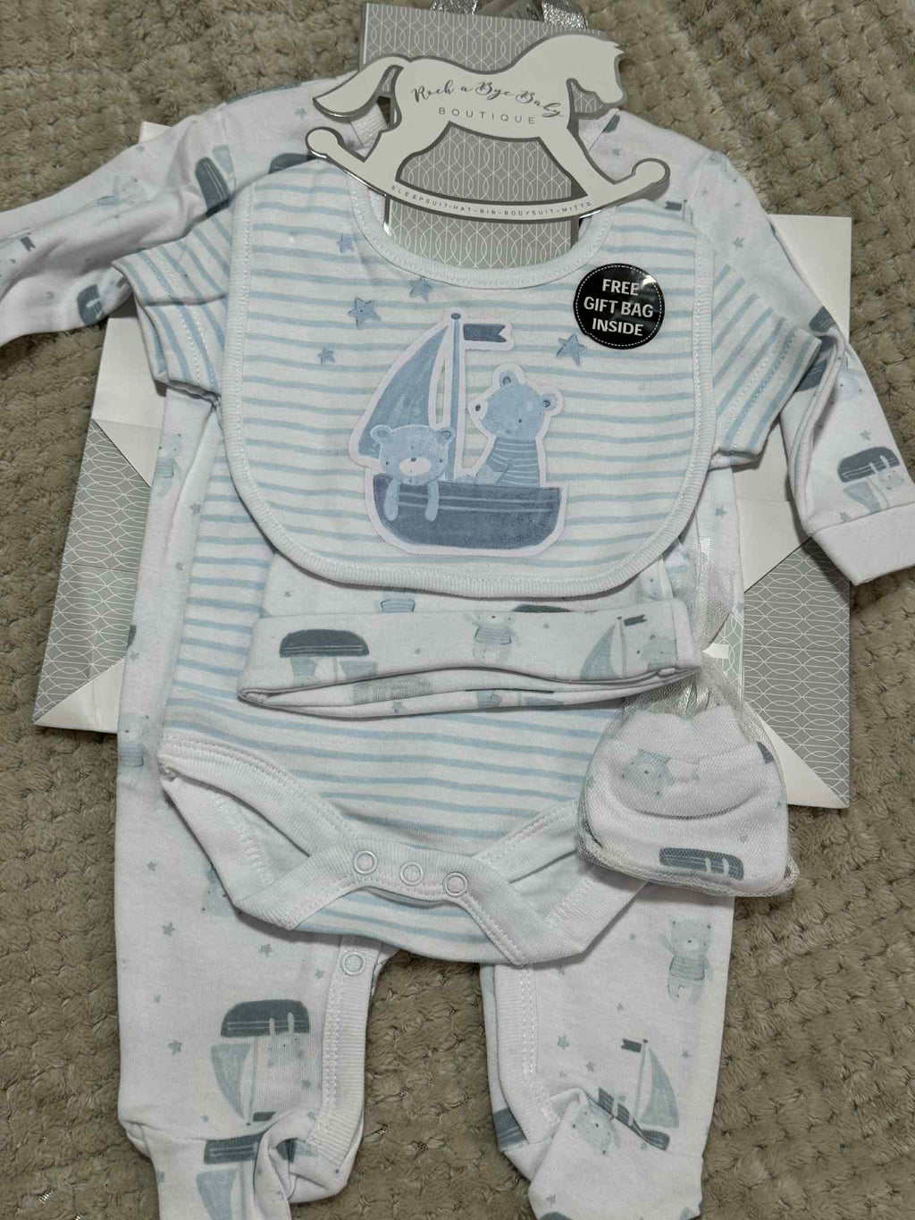 Adorable Baby Boys 5 Piece Layette gift set in Blue &amp; White with Teddy's prints. Set consists of sleepsuit, bodysuit, hat, bib and mittens and Giftbag.