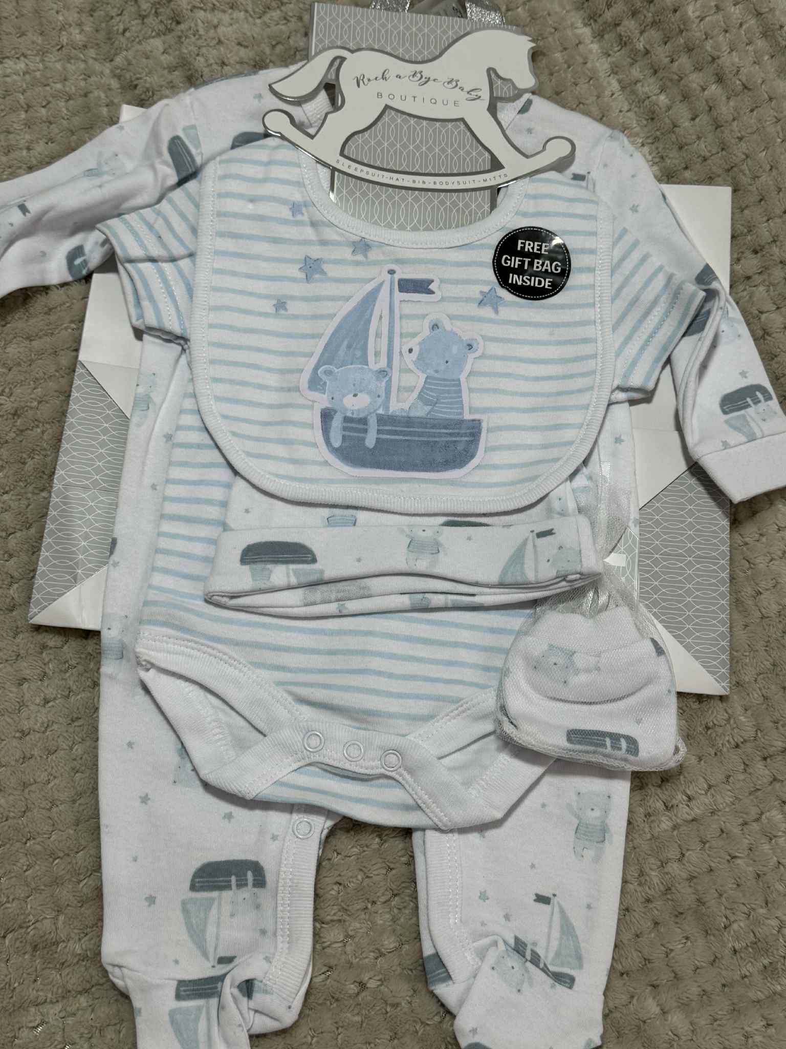 Adorable Baby Boys 5 Piece Layette gift set in Blue &amp; White with Teddy's prints. Set consists of sleepsuit, bodysuit, hat, bib and mittens and Giftbag.