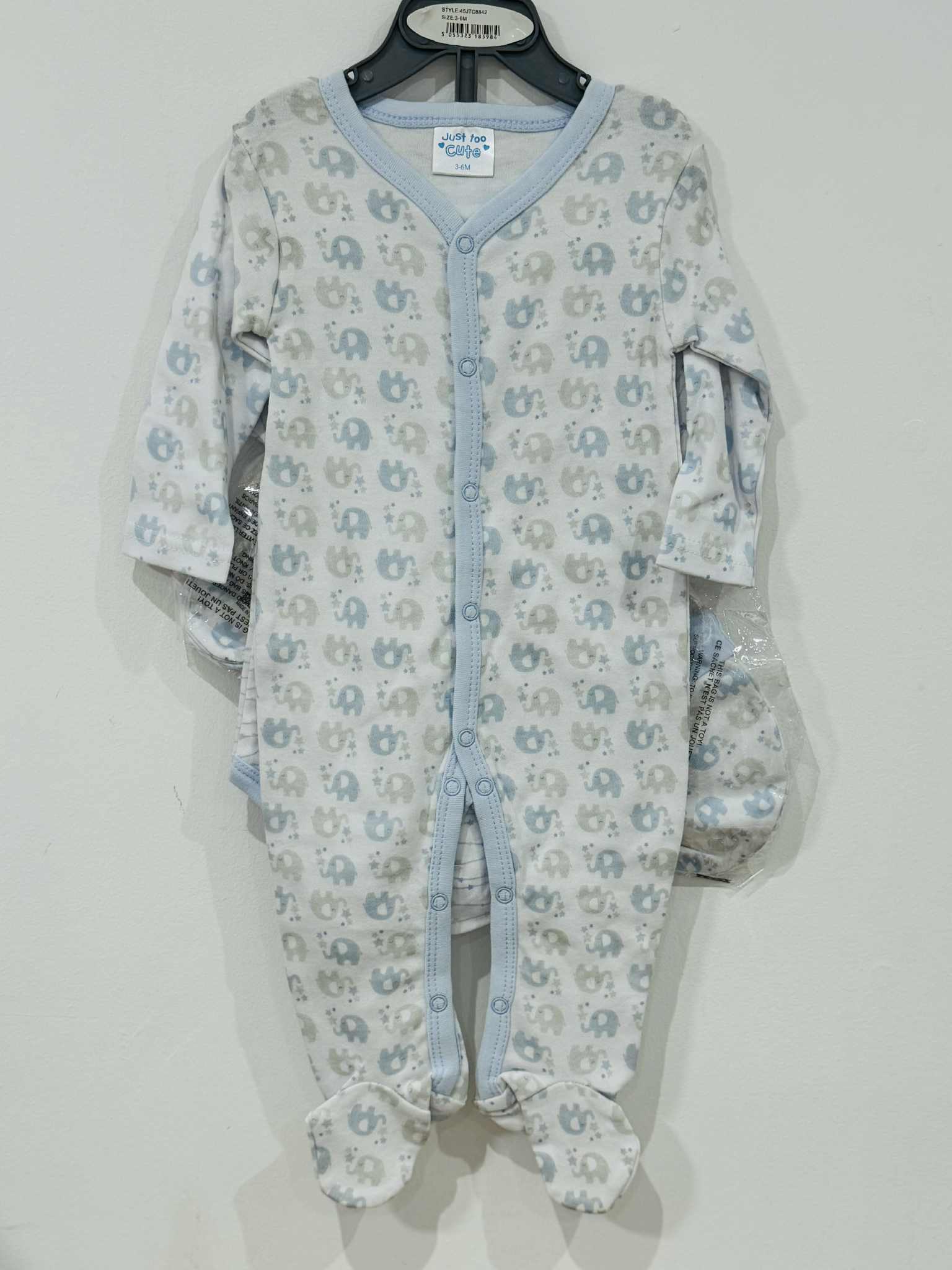 Baby onesie with elephant pattern on a white background