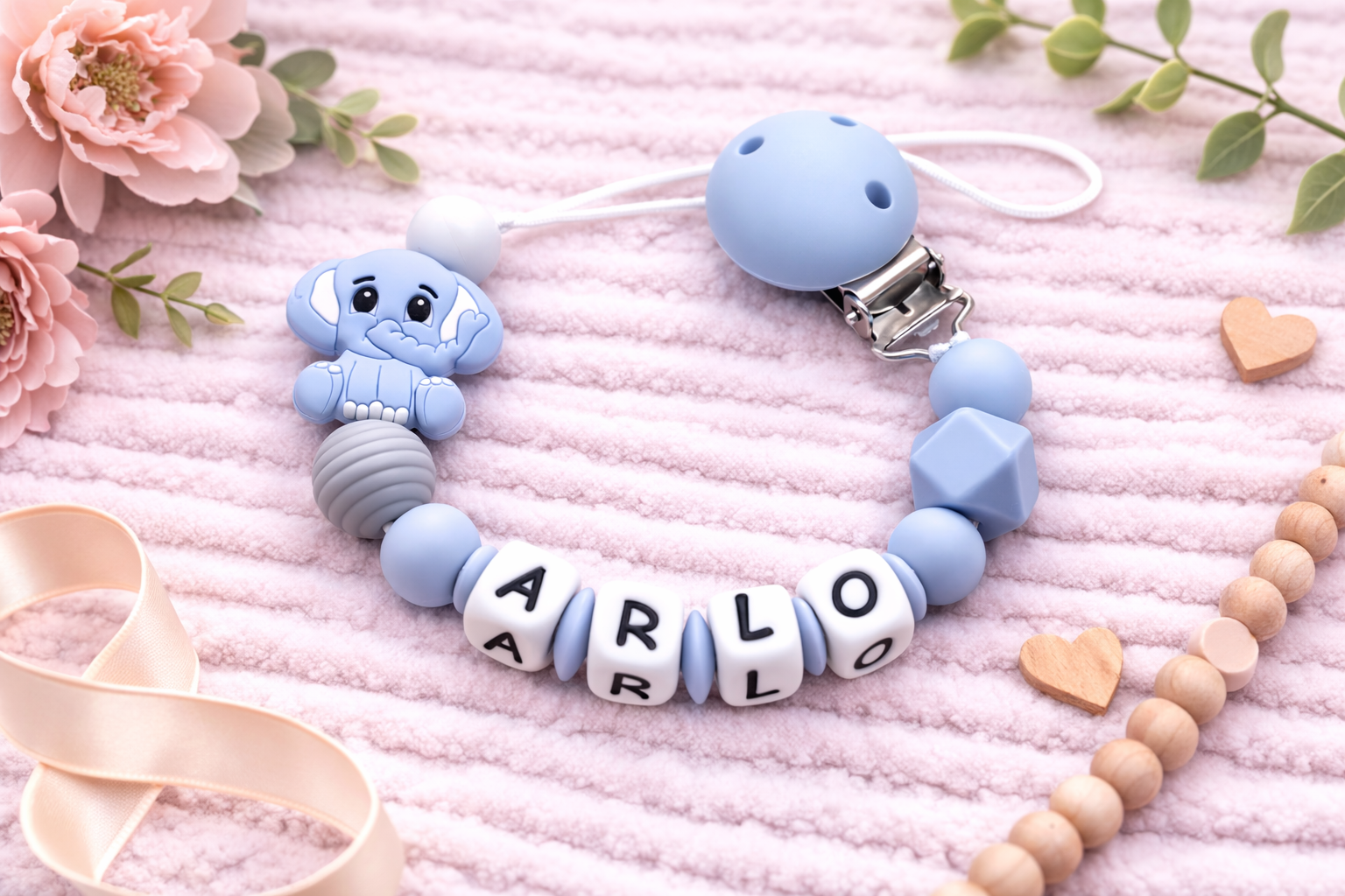 Premium blue elephant dummy clip with all-silicone letter beads. 100% food-grade silicone, custom name. Safe for teething babies. Perfect gift! 🐘