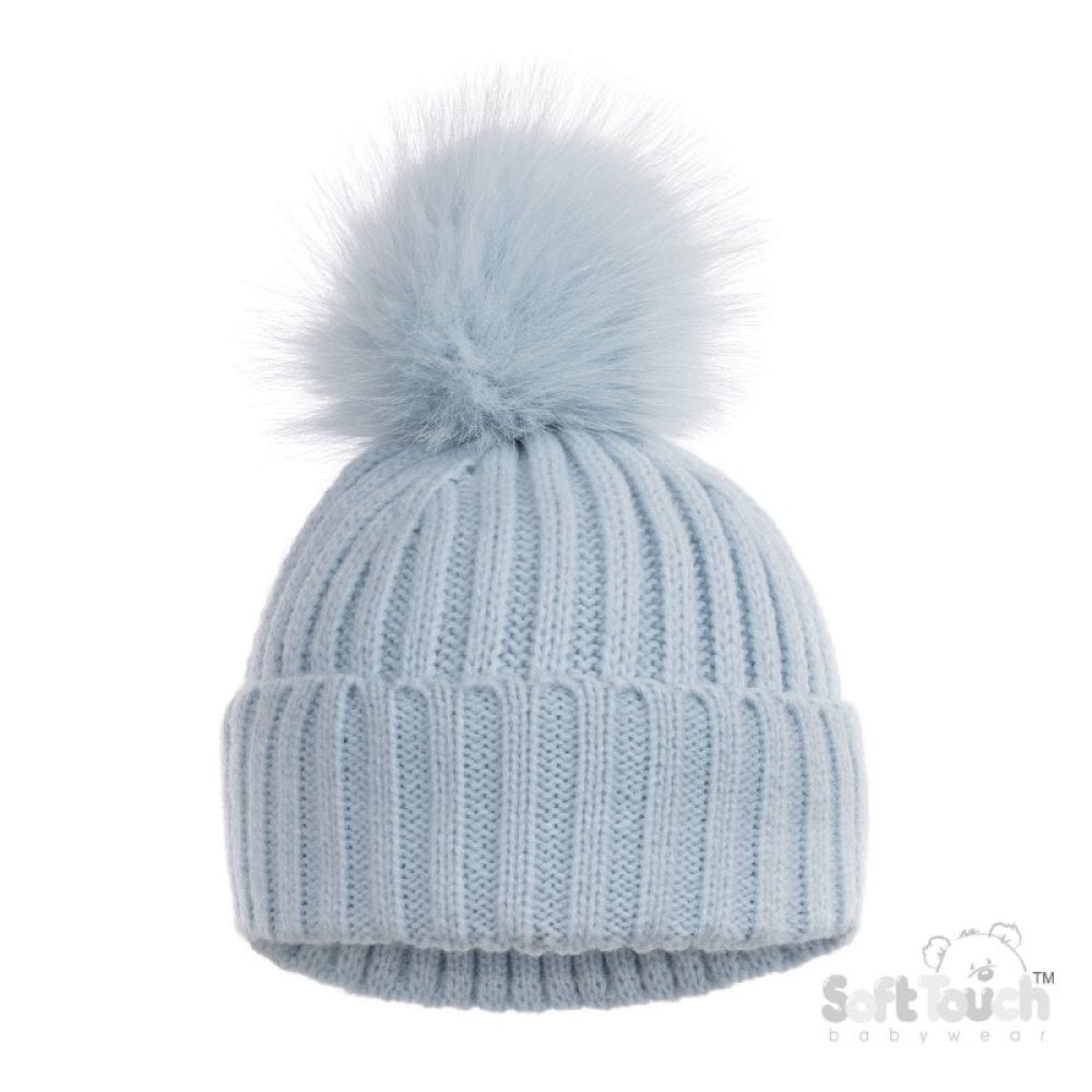 Light blue knit beanie with a fluffy pom-pom on a white background
