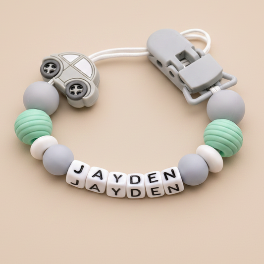 Green/Grey Car Dummy Clip on Beige Background