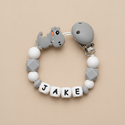 Grey & White Dinosaur Dummy Clip - Beige Background