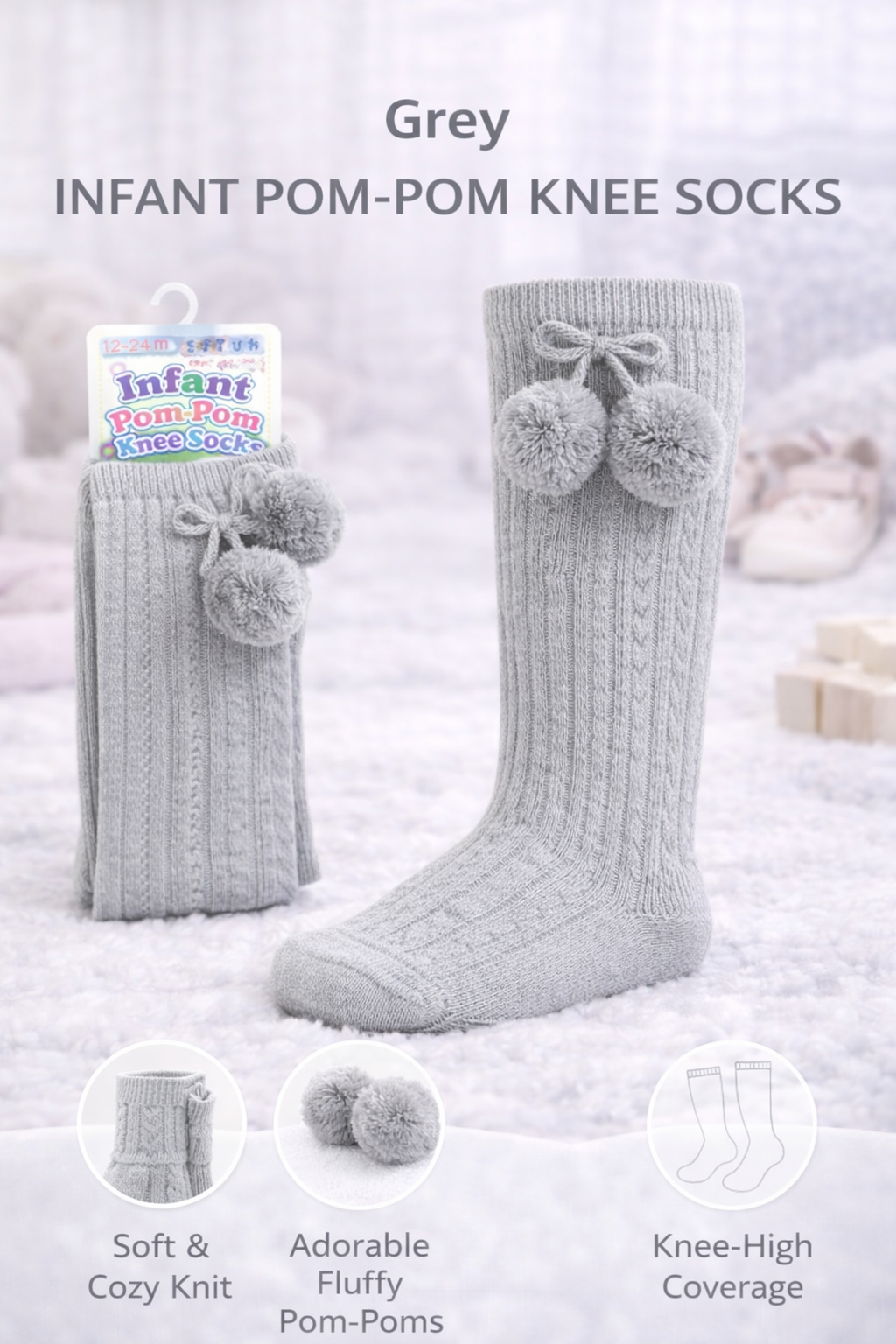 Sleeping newborn baby dressed in a neutral ribbed onesie, wearing grey knit knee-high socks with fluffy pom-poms, resting on a soft white blanket with wooden baby toys nearby.