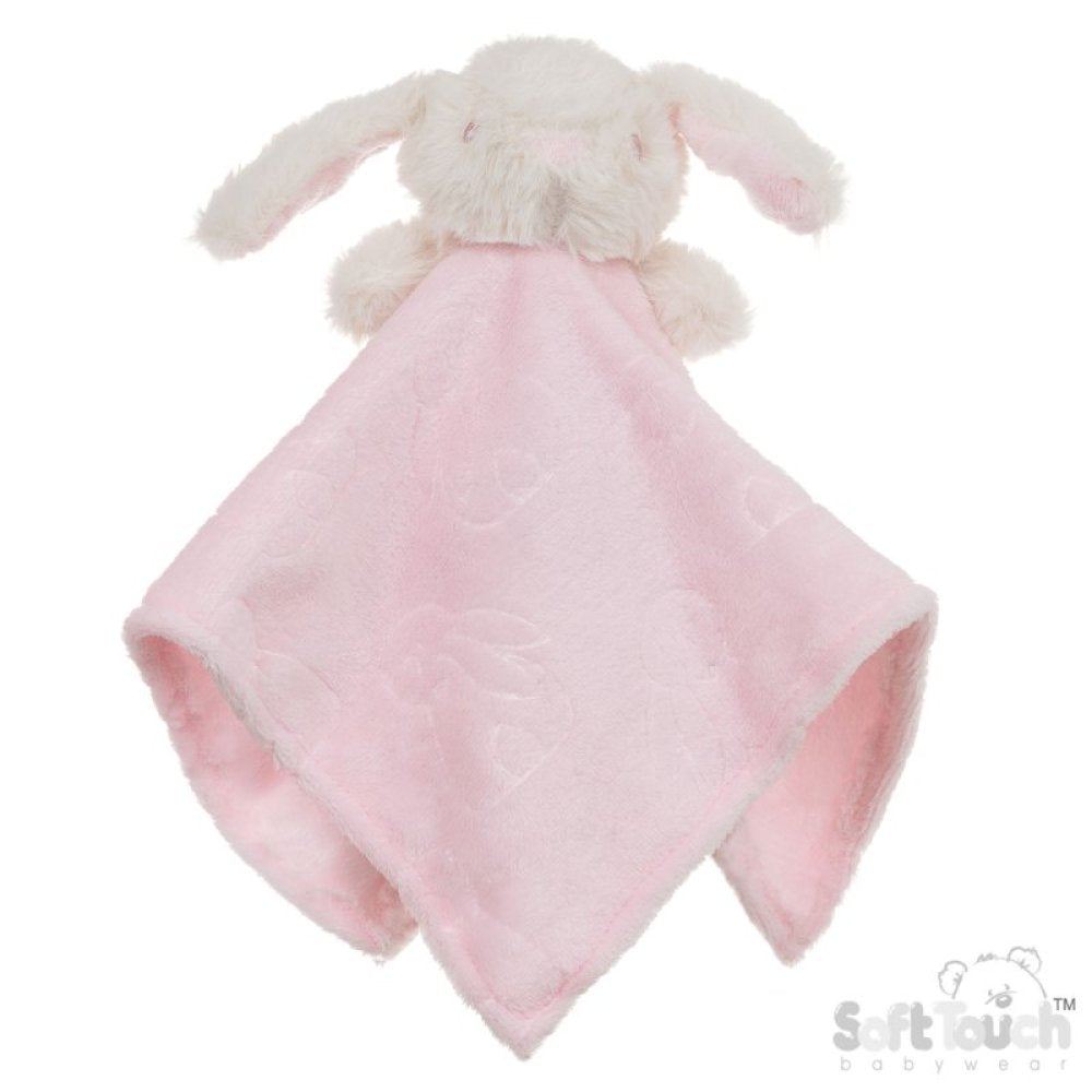 Pink plush blanket with a white bunny toy on a white background
