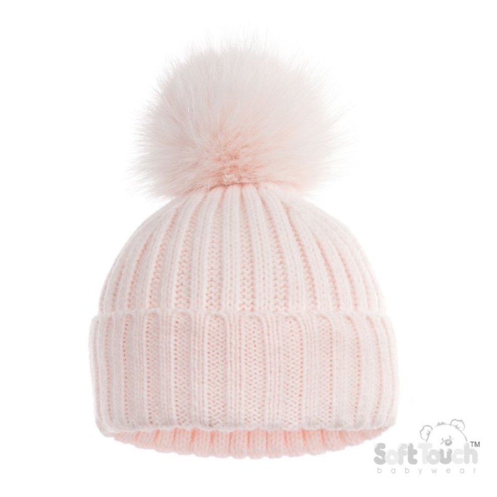 Pink knit beanie with a fluffy pom-pom on a white background