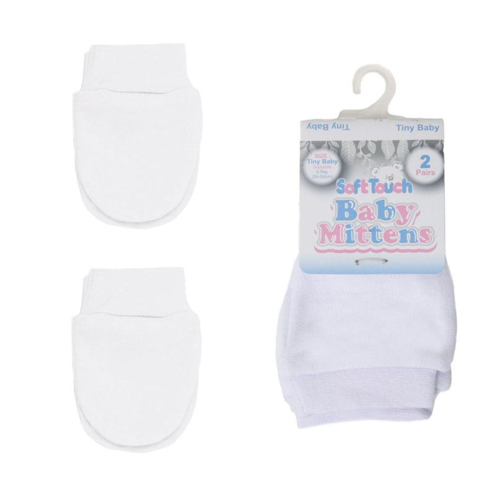 White premature baby mittens with packaging on a white background