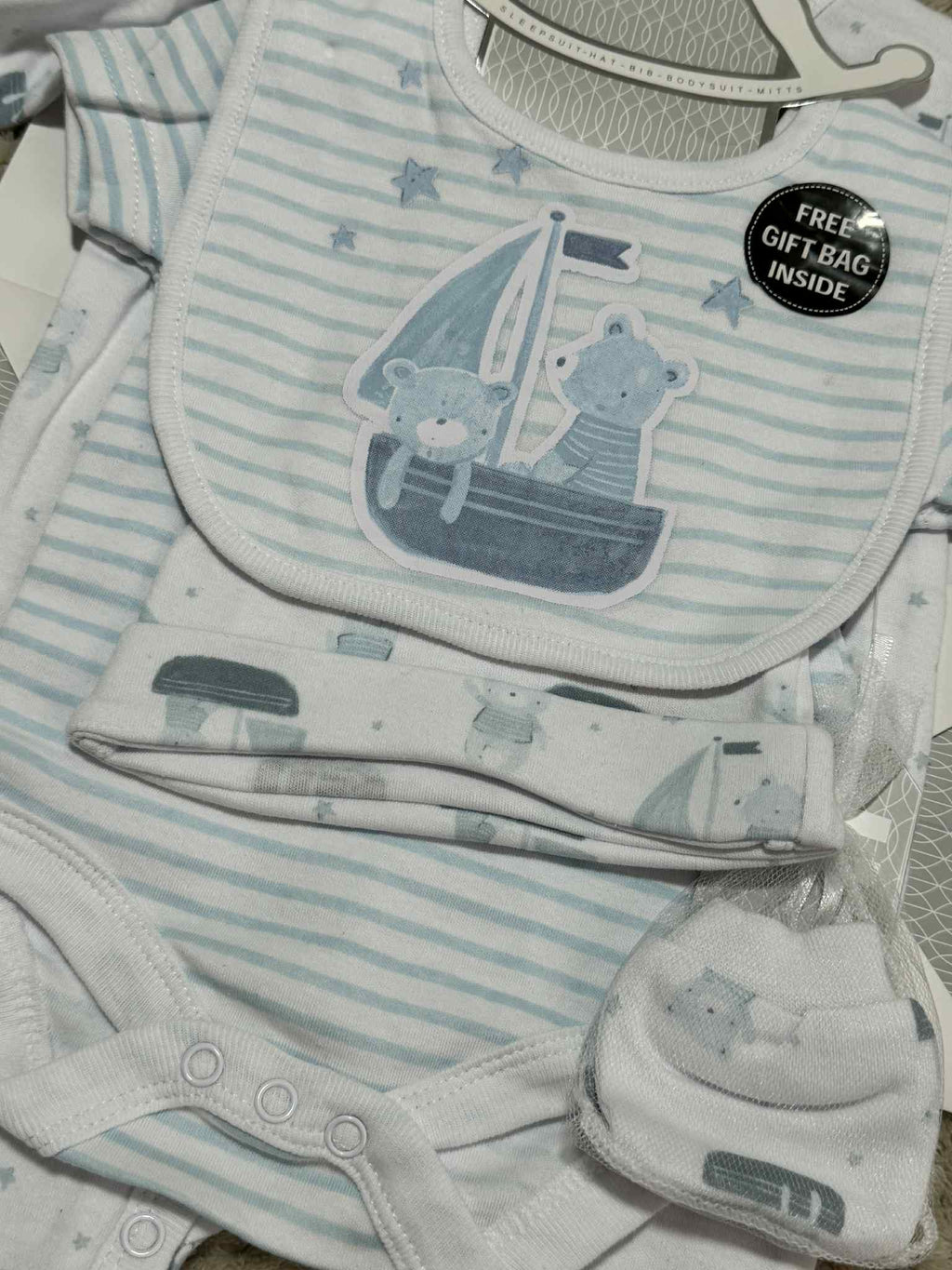 Adorable Baby Boys 5 Piece Layette gift set in Blue &amp; White with Teddy's prints. Set consists of sleepsuit, bodysuit, hat, bib and mittens and Giftbag.