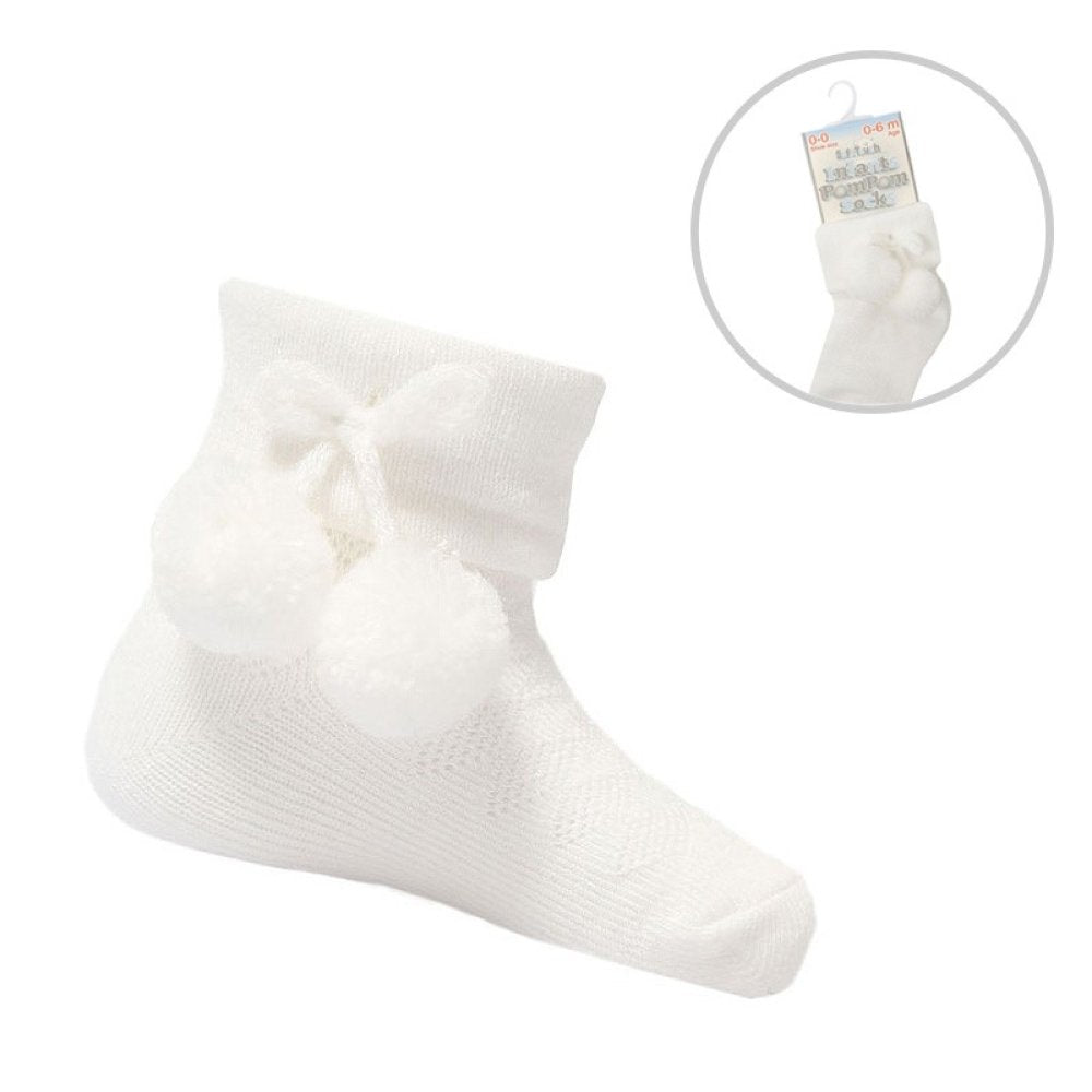 White baby sock with a close-up inset showing a tag on a white background